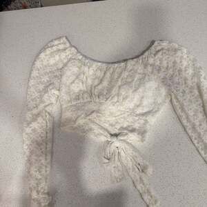 Beyond The Radar Women's Floral Lace Tie Back Long Sleeve Top